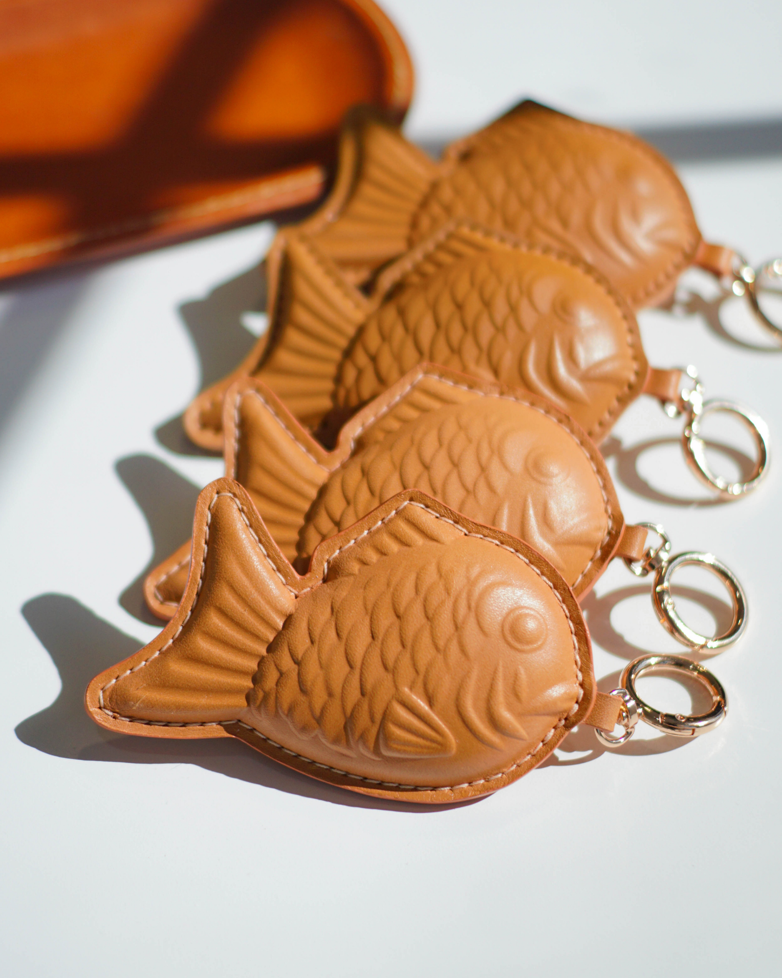 Hand-crafted luxury leather goods showcasing premium stitching and materials